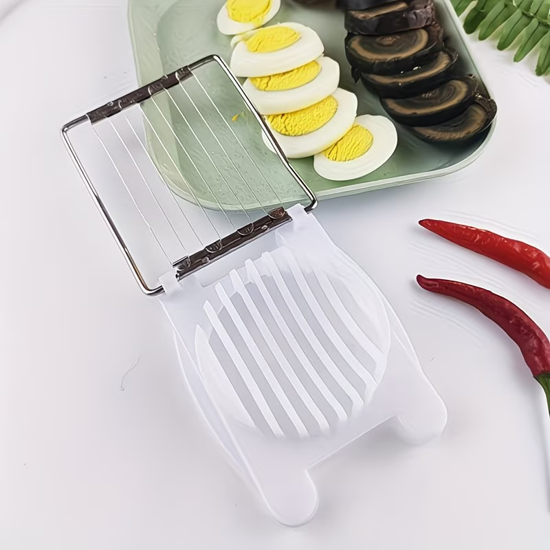 A household multifunctional egg slicer