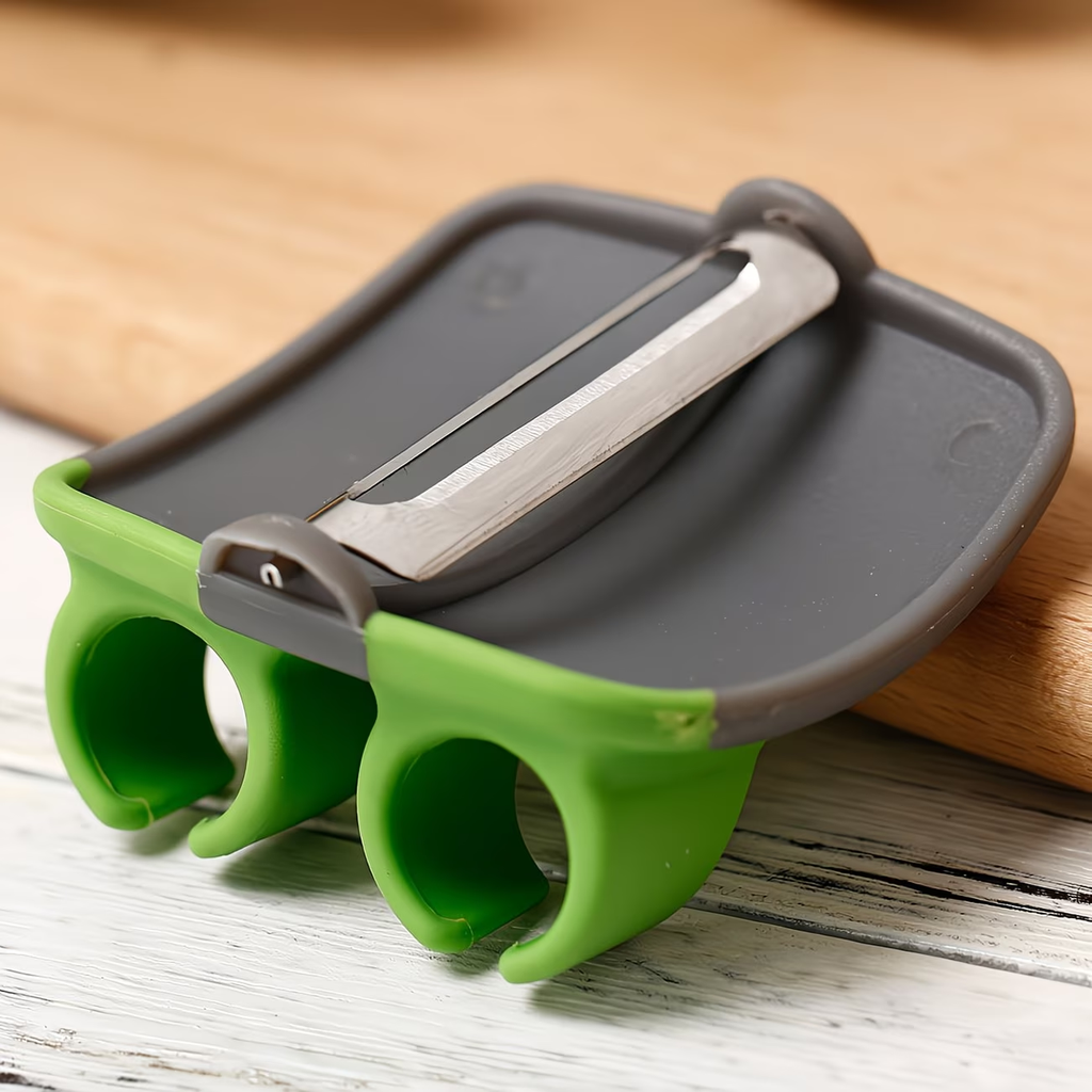 A stainless steel handheld peeler