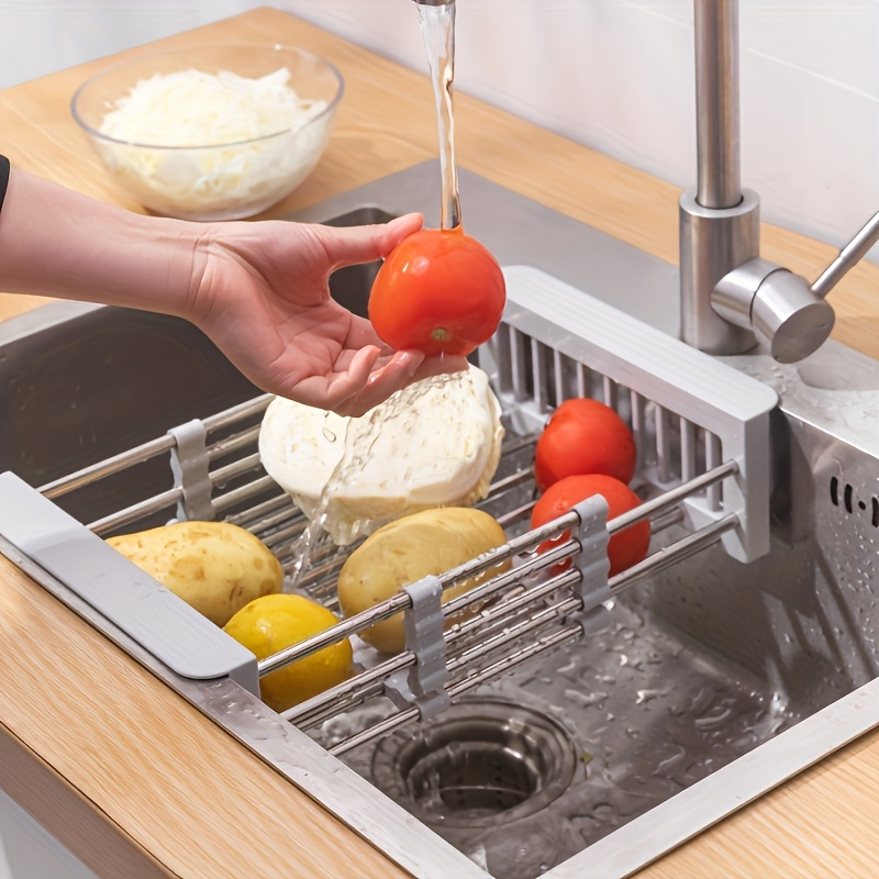 Adjustable stainless steel sink rack with drain basket