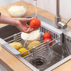 Adjustable stainless steel sink rack with drain basket