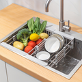 Adjustable stainless steel sink rack with drain basket