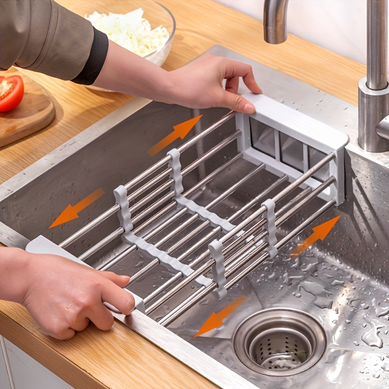 Adjustable stainless steel sink rack with drain basket