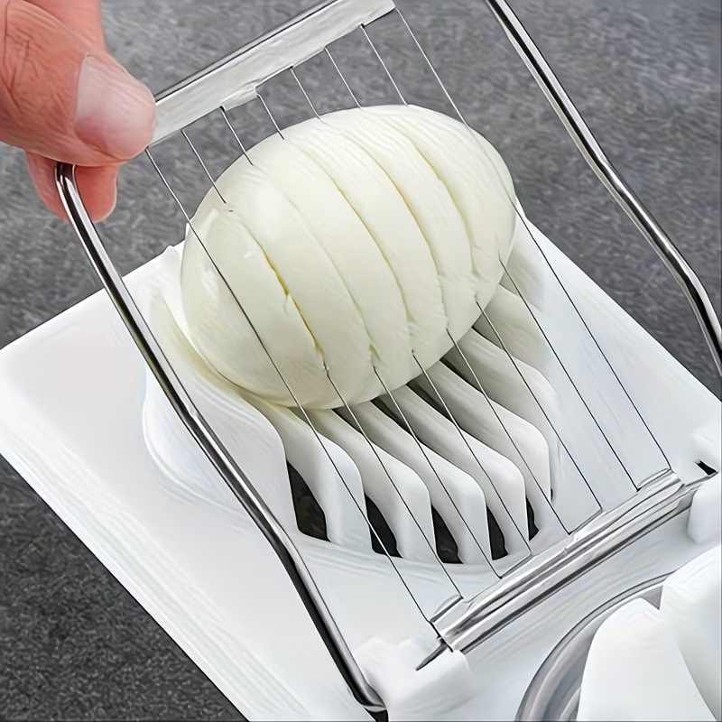 A household multifunctional egg slicer
