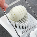 A household multifunctional egg slicer