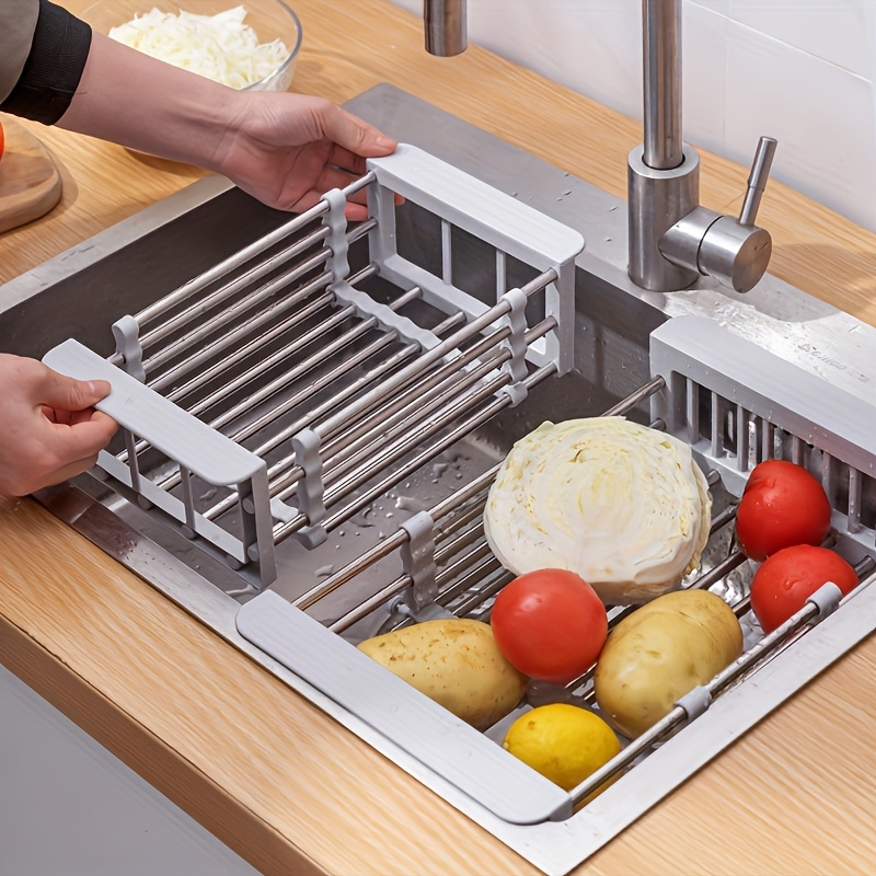 Adjustable stainless steel sink rack with drain basket